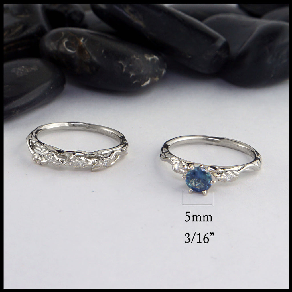 sapphire size 5mm 3/16"  and 6 diamonds size .015 each