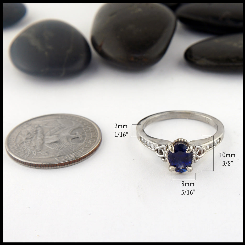 Blue sapphire ring 10mm wide tapers to 2mm band
