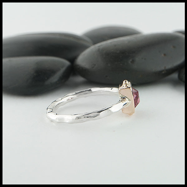 Profile view of custom ring in sterling silver with a 14K Rose gold bezel and bead accents, set with a Rose Cut Pink Tourmaline.