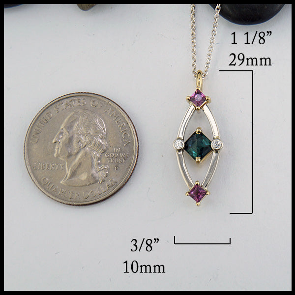 Pendant measures 1 1/8" by 3/8"