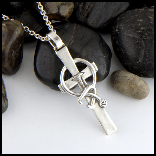 Small Caring Cross in silver