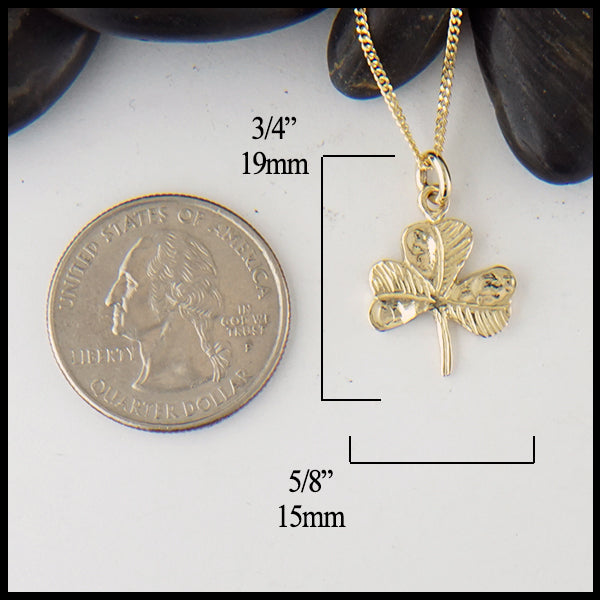 Simple shamrock pendant measures 3/4" by 5/8"
