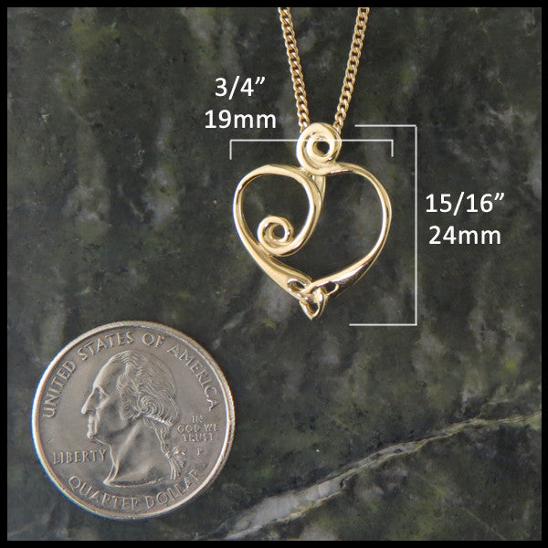 Celtic spiral heart pendant measures 3/4" by 15/16"