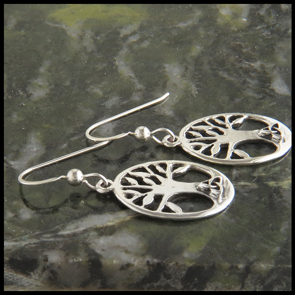Profile view of Family Tree Earrings with triquetra in silver