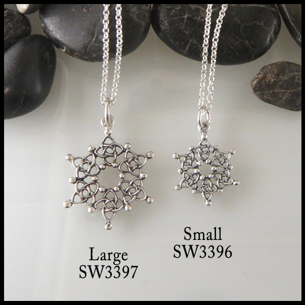 Small and large snowflake pendants