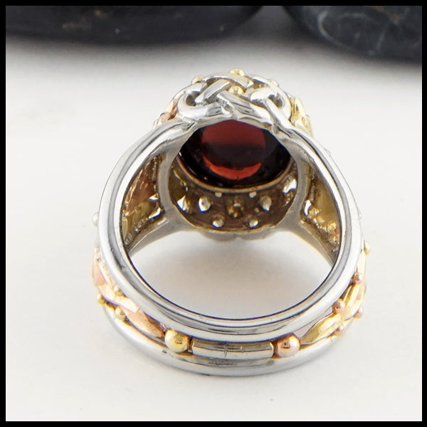 Reverse view of Garnet Cathedral ring in yellow, rose, and white gold