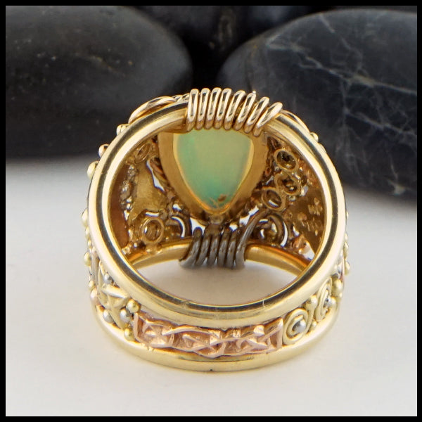 Reverse view of Ethiopian Opal Ring in yellow, rose, and white gold