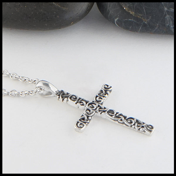 Profile view of Trinity Scroll Cross in Sterling Silver
