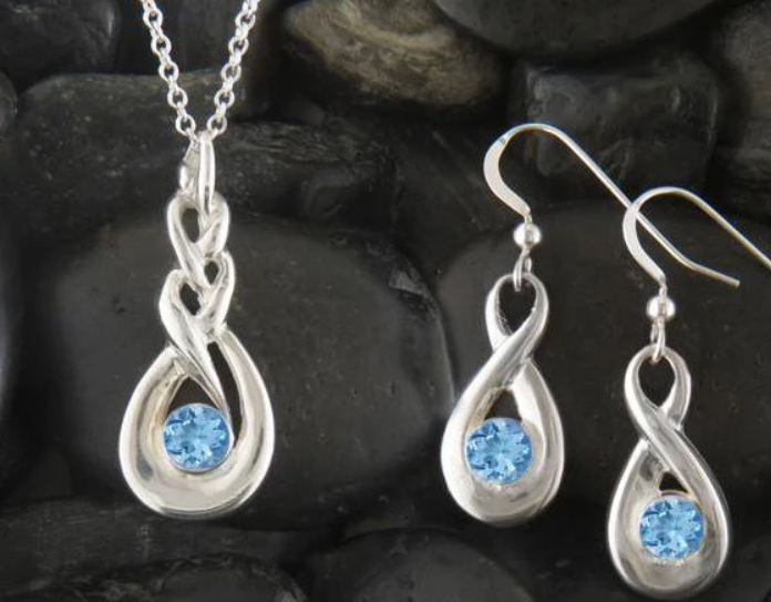 Walker Metalsmith’s Handcrafted Celtic Birthstone Jewelry for March is Simulated Aquamarine