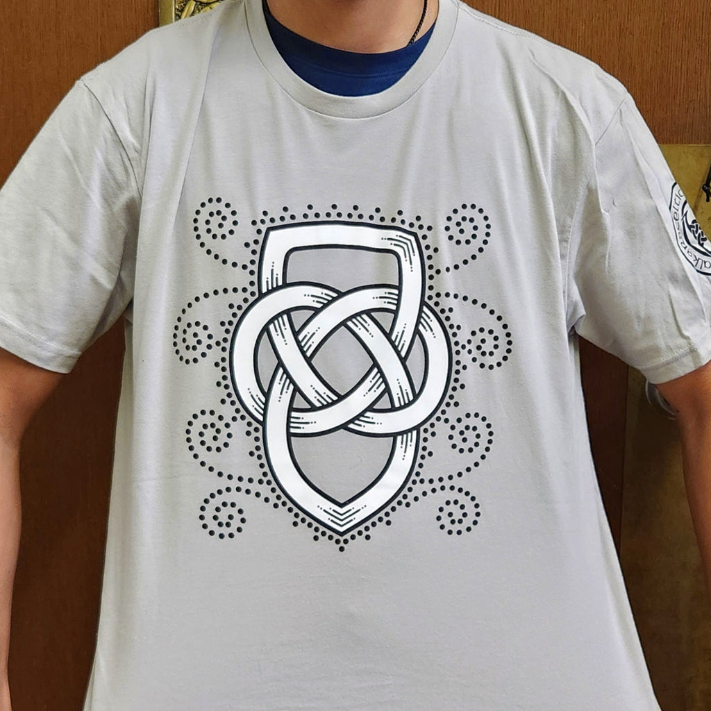 Light Gray t-shirt with a black and white Father's Knot design on a wooden background