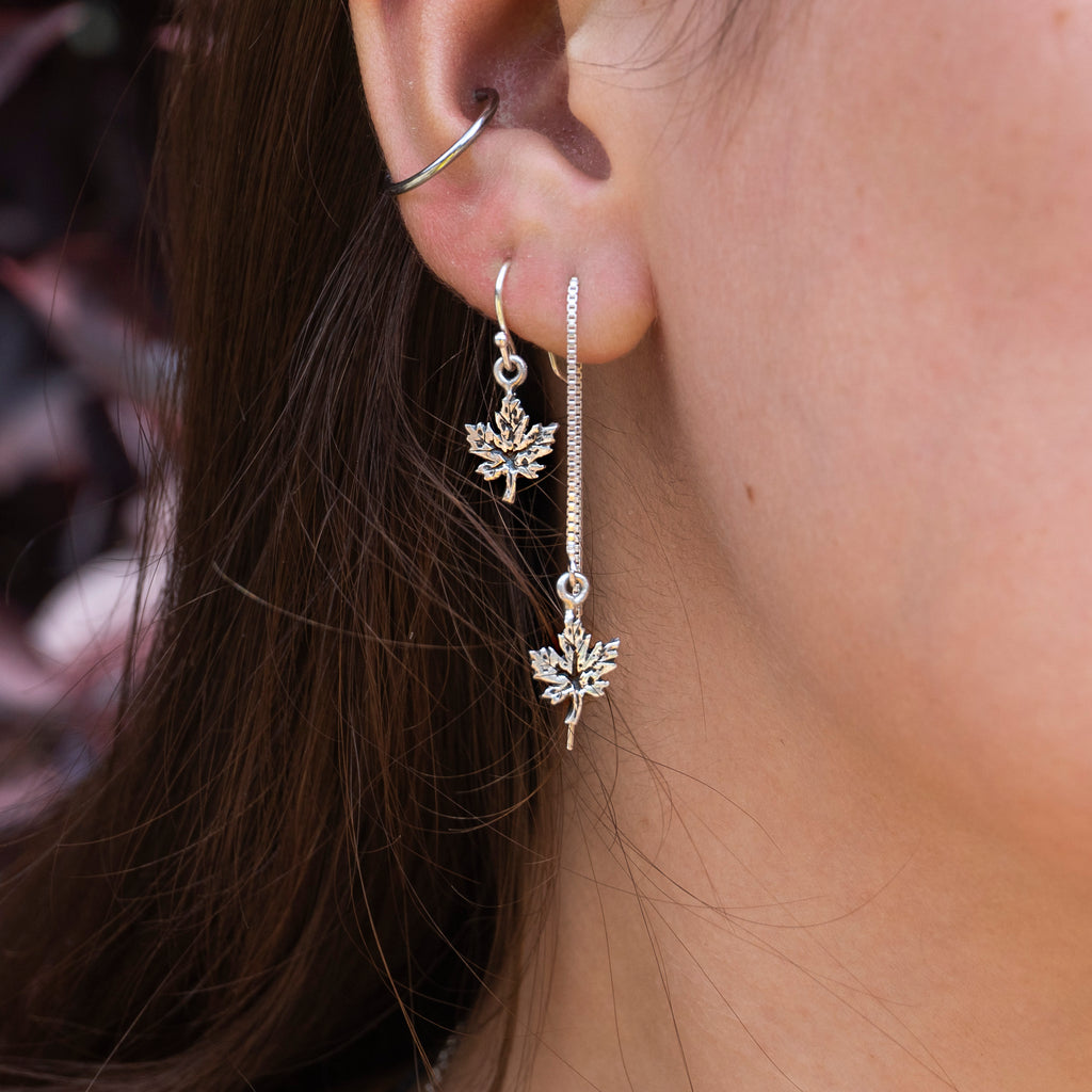 Lady wearing Maple Drop and Threaded Earrings