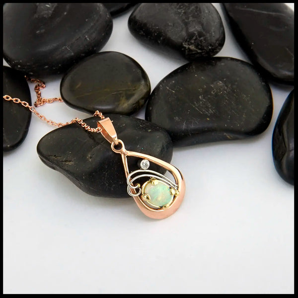 Opal and Diamond set Pendant in 14KR