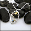 Tanzanite Pendant Set in Sterling Silver and 14K/18K gold 