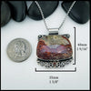 Crazy Lace Agate and Garnet pendant in Sterling Silver
40mm x 35mm