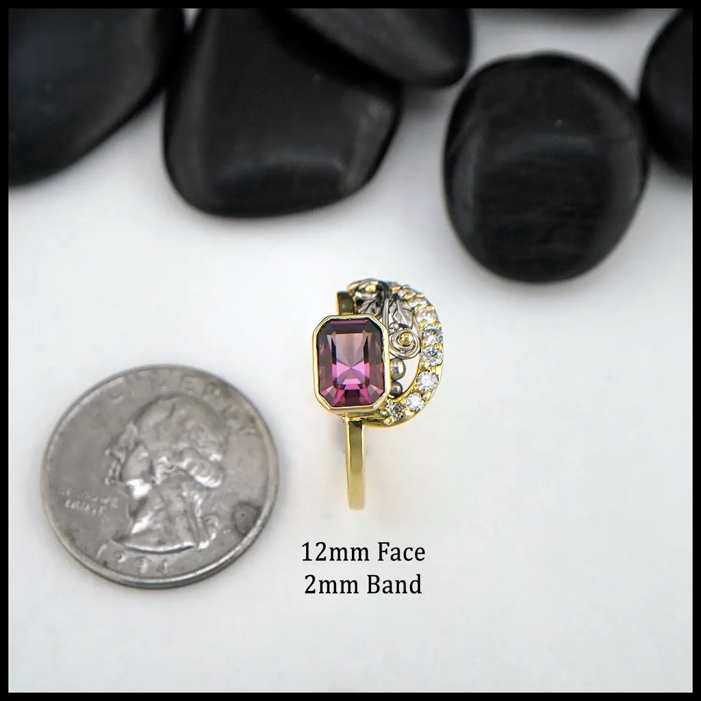 Rhodolite Garnet set in 18K Yellow and 14K White Gold Ring with Diamonds
12mm Face, 2mm Band