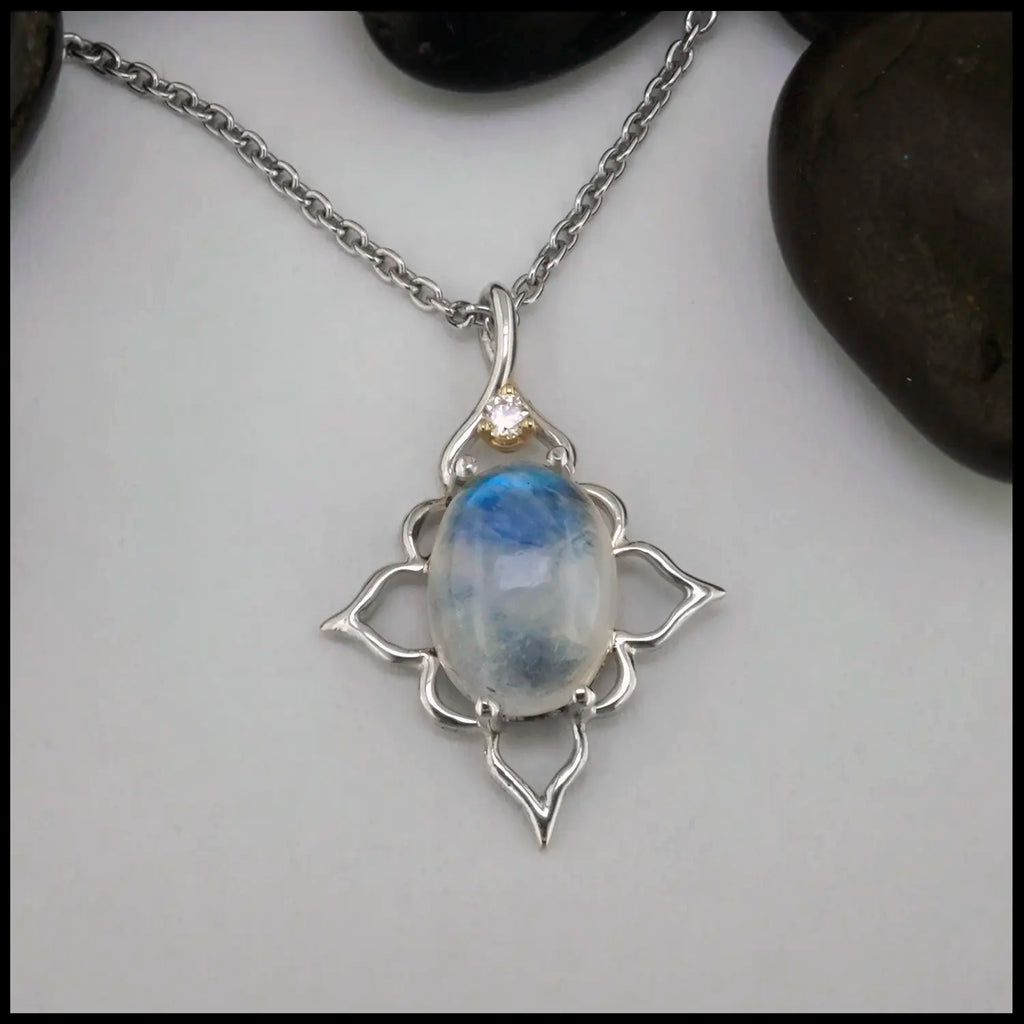 Moonstone and Diamond Pendant set in Sterling Silver and 14K yellow Gold