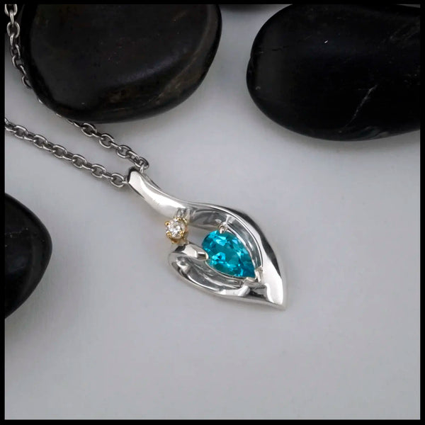 Blue Topaz and Diamond Pendant set in Sterling Silver and 14K Gold