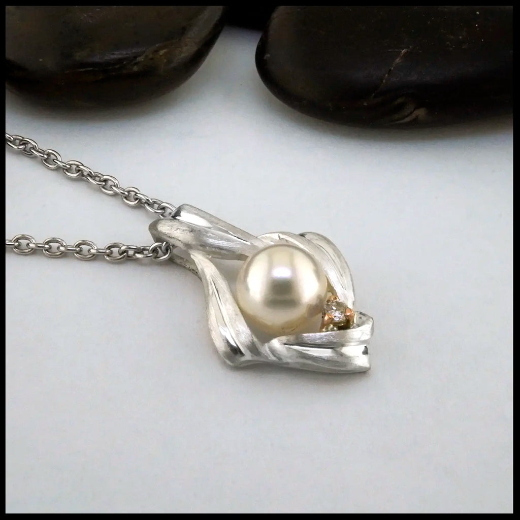 Pearl and Diamond Pendant set in Sterling Silver and 14K Rose Gold