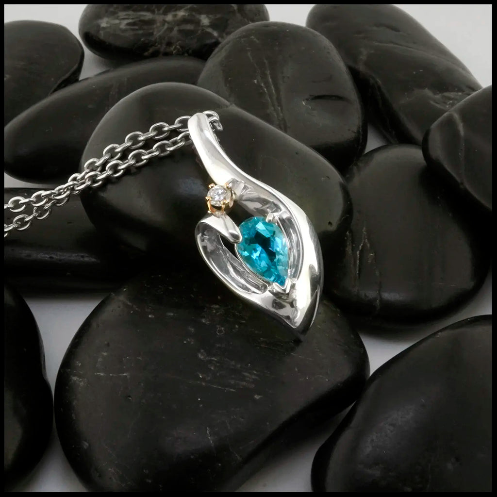 Blue Topaz and Diamond Pendant set in Sterling Silver and 14K Gold