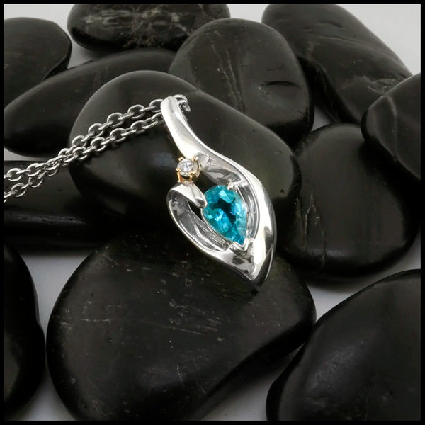 Blue Topaz and Diamond Pendant set in Sterling Silver and 14K Gold