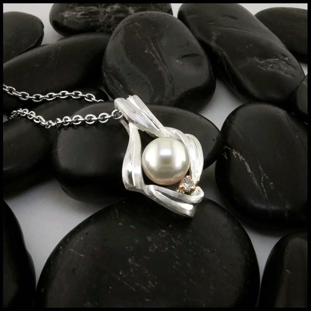 Pearl and Diamond Pendant set in Sterling Silver and 14K Rose Gold