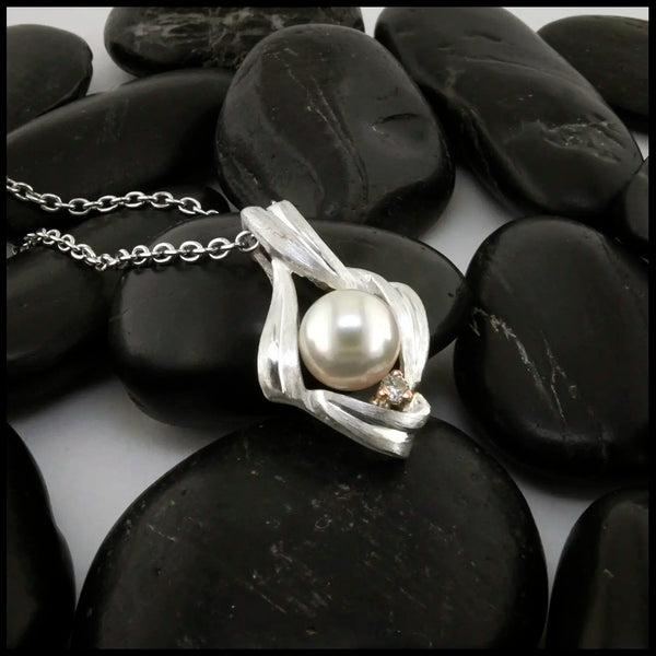 Pearl and Diamond Pendant set in Sterling Silver and 14K Rose Gold