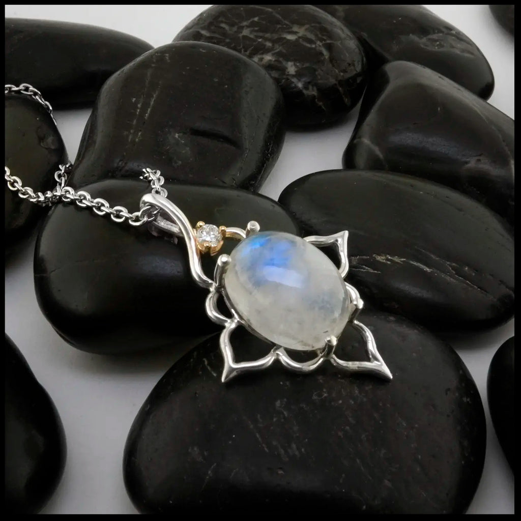 Moonstone and Diamond Pendant set in Sterling Silver and 14K yellow Gold
