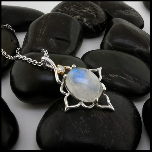 Moonstone and Diamond Pendant set in Sterling Silver and 14K yellow Gold