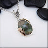 Agate Pendant set in Sterling Silver, 14K Rose Gold, and 18K Yellow Gold.