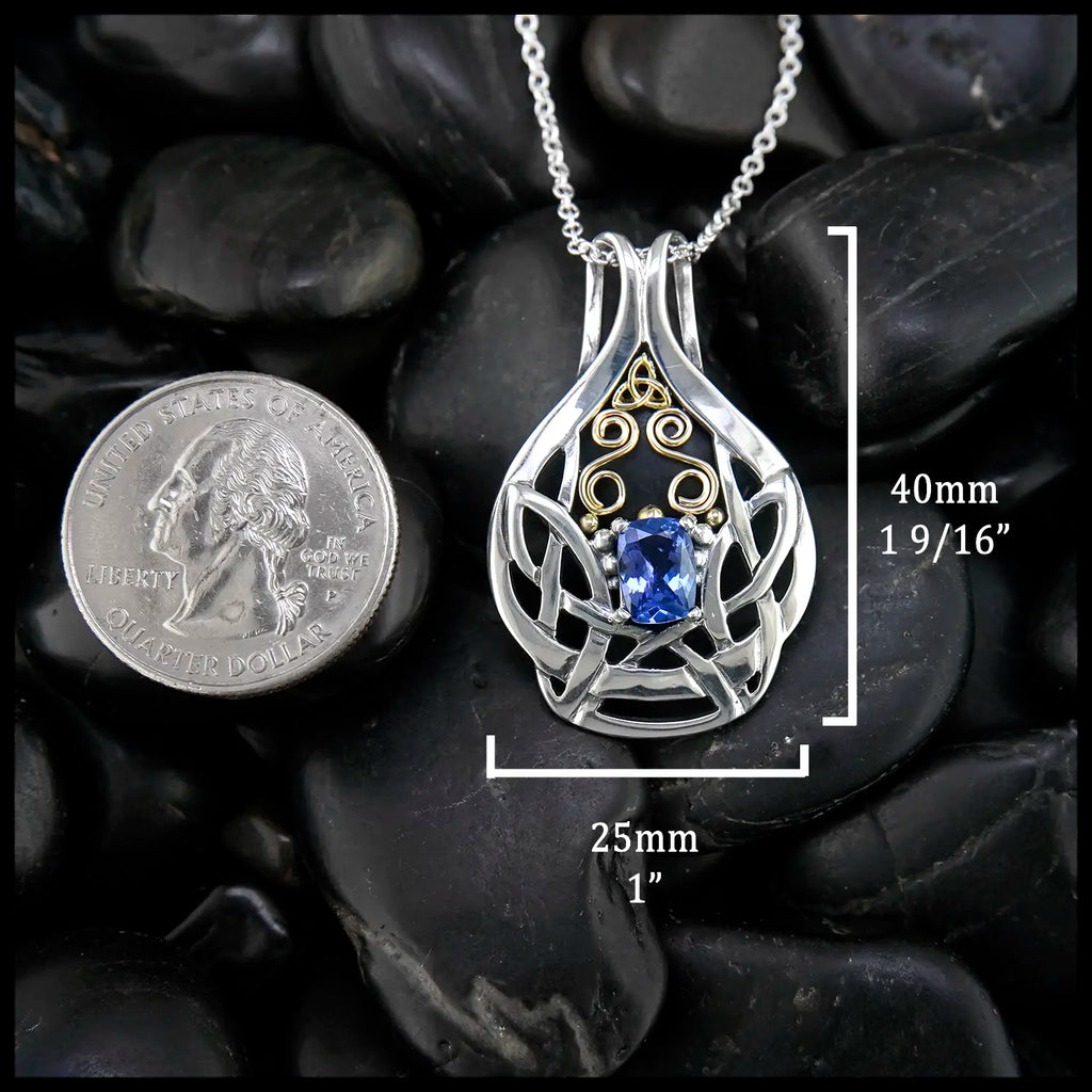 8x6mm Tanzanite Pendant in Sterling Silver and 18K Yellow Gold
40mm x 25mm