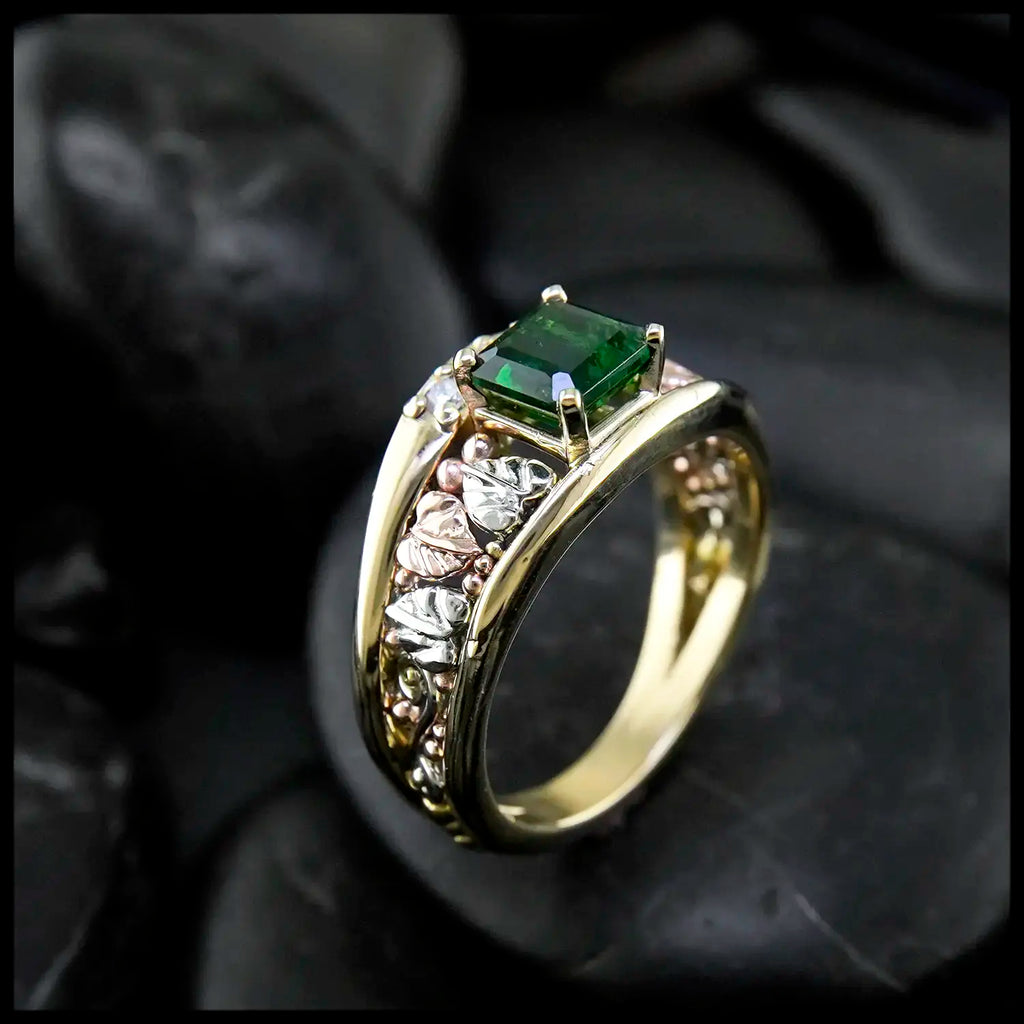 Emerald and Diamond frame ring in 14K Yellow, Rose and white gold.