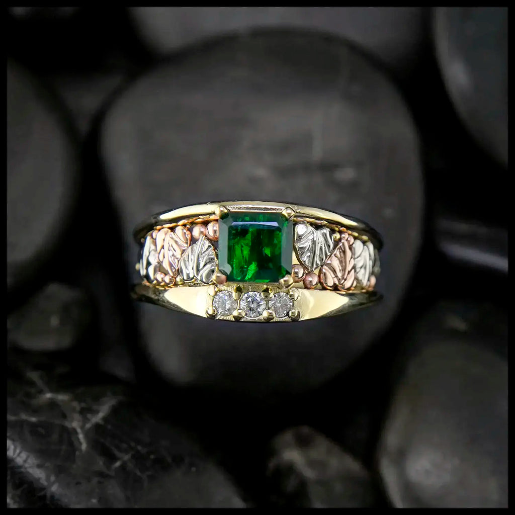 Emerald and Diamond frame ring in 14K Yellow, Rose and white gold.
