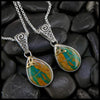 Peruvian Opal Pendants Set in Sterling Silver with 18K Yellow Gold Trinity Knots