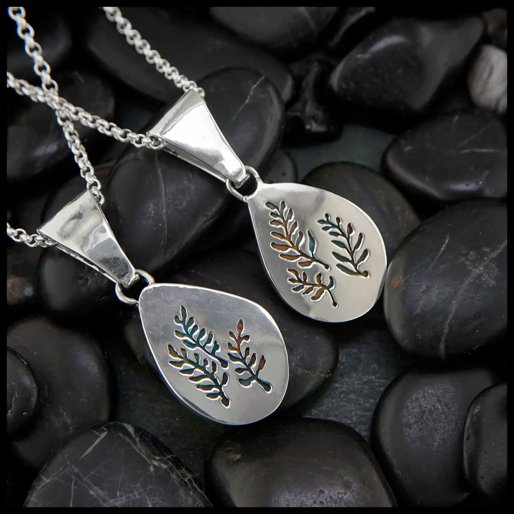 Peruvian Opal Pendants Set in Sterling Silver with 18K Yellow Gold Trinity Knots