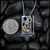 Tanzanite and Diamond Forget Me Not Pendant in Sterling Silver, 14K Rose Gold, and 18K Yellow Gold
30mm x 15mm