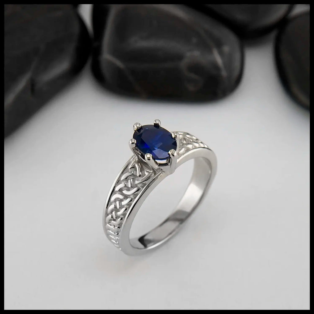 Oval Sapphire Tapered Knot ring in 14K White Gold
