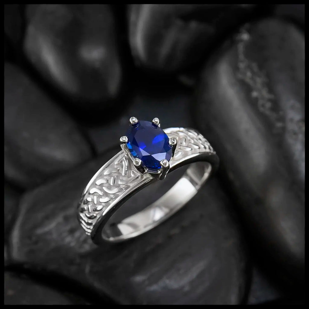 Oval Sapphire Tapered Knot ring in 14K White Gold
