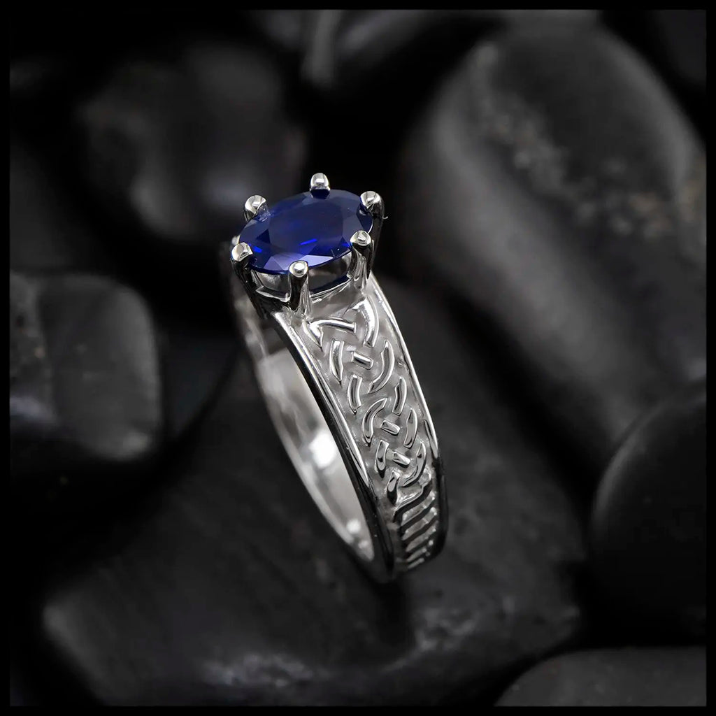 Oval Sapphire Tapered Knot ring in 14K White Gold