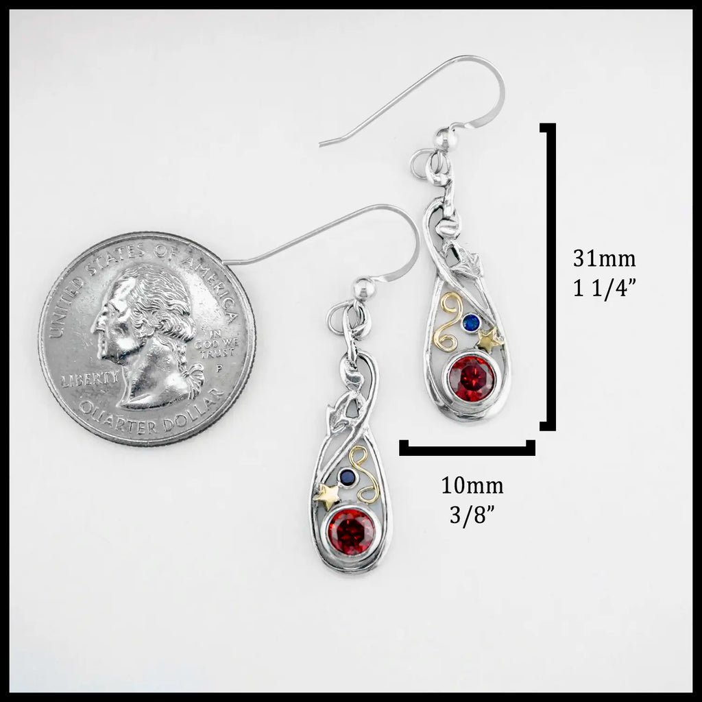 The measurements on these earrings are: 31mm or 1 1/4" Tall (Not including ear wire) and 10mm or 3/8" Wide.