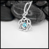 Sterling Silver Trinity Heart Pendant set with a 4mm Blue Topaz. Includes an 18" Cable Chain. This is a Limited Edition Set.