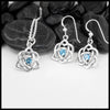 Sterling Silver Trinity Heart Pendant and matching Earrings set with a 4mm Blue Topaz. Includes an 18" Cable Chain. This is a Limited Edition Set.