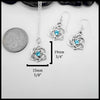 Sterling Silver Trinity Heart Pendant and matching Earrings set with a 4mm Blue Topaz. Includes an 18" Cable Chain. The measurements are: 19mm or 3/4" Tall and 15mm or 5/8" Wide