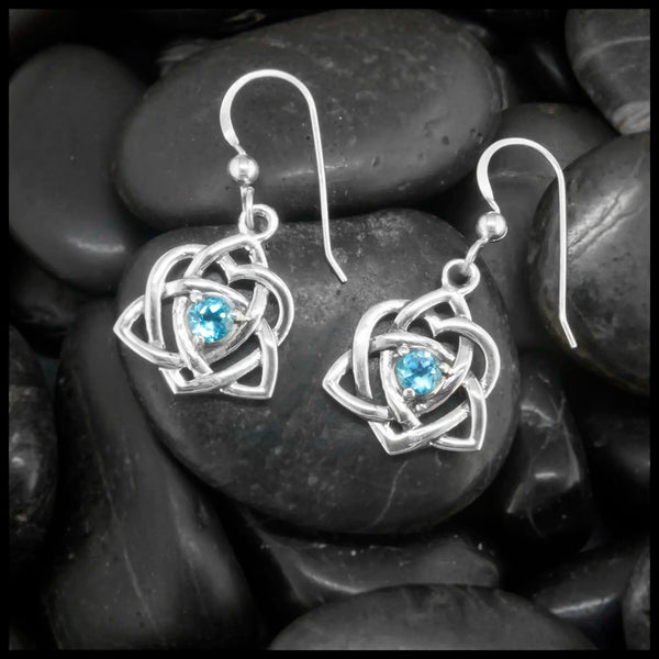 Sterling Silver Trinity Heart  Earrings set with a 4mm Blue Topaz. This is a Limited Edition Set.