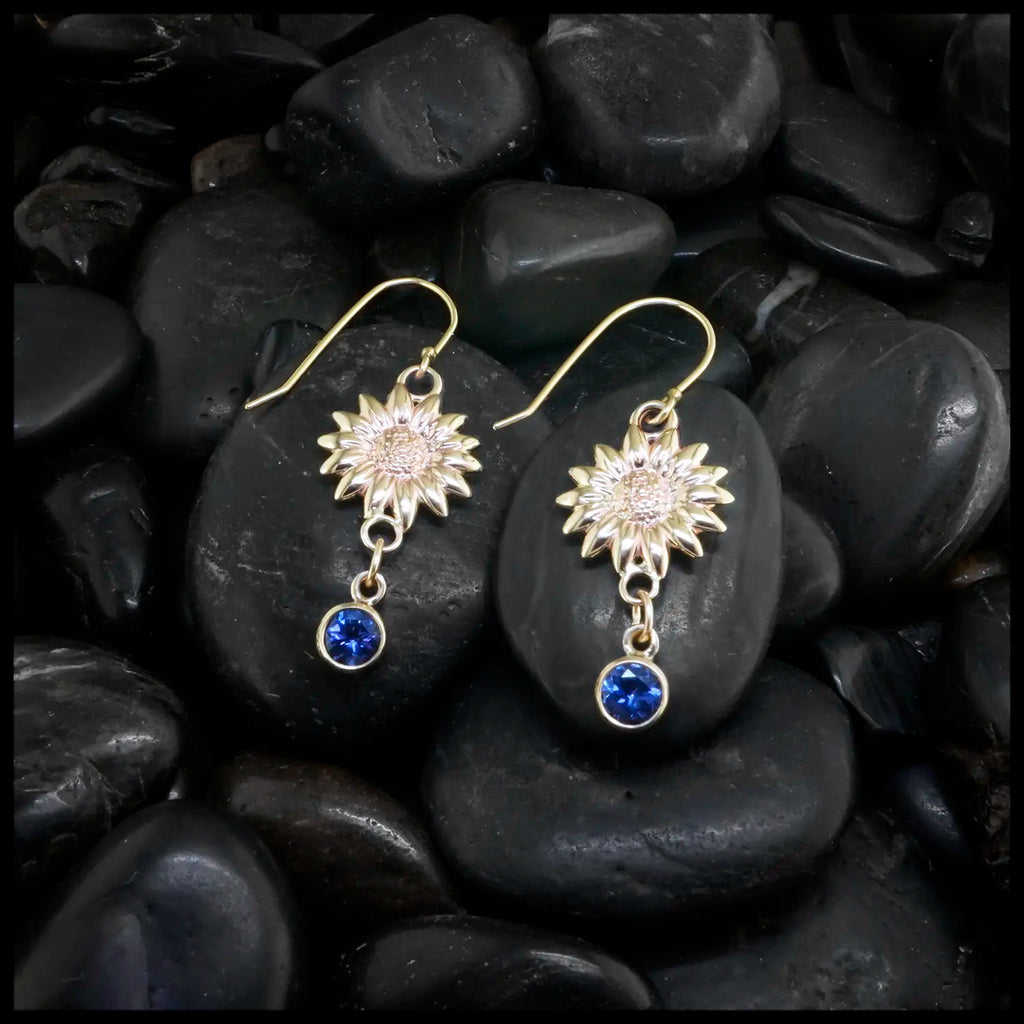 14k Yellow Gold Sunflower Drop Earrings with Bright Tanzanites Dangling, Below Bezel Set in 14K Yellow Gold. Made by our craftsman Nicole