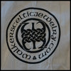 Logo of Celtic jewelry brand on the left sleeve of the Father's knot Shirt