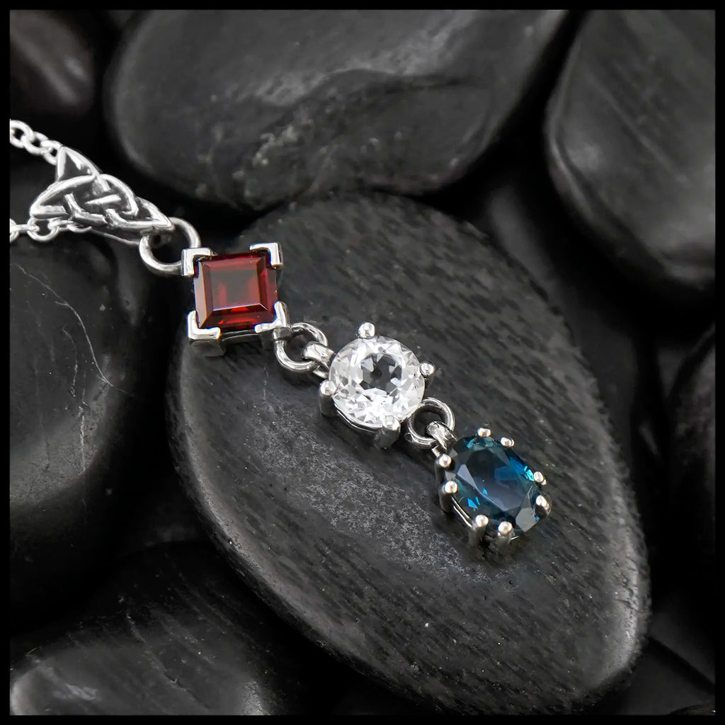 Garnet, White topaz, and Blue Topaz Patriotic pendant in Sterling Silver