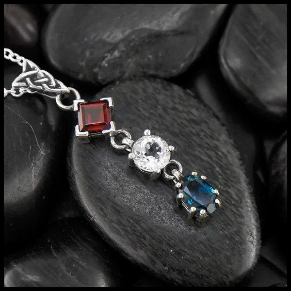 Garnet, White topaz, and Blue Topaz Patriotic pendant in Sterling Silver