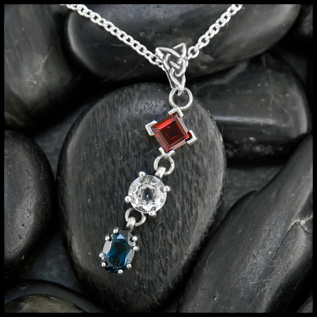 Garnet, White topaz, and Blue Topaz Patriotic pendant in Sterling Silver