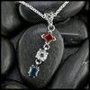 Garnet, White topaz, and Blue Topaz Patriotic pendant in Sterling Silver