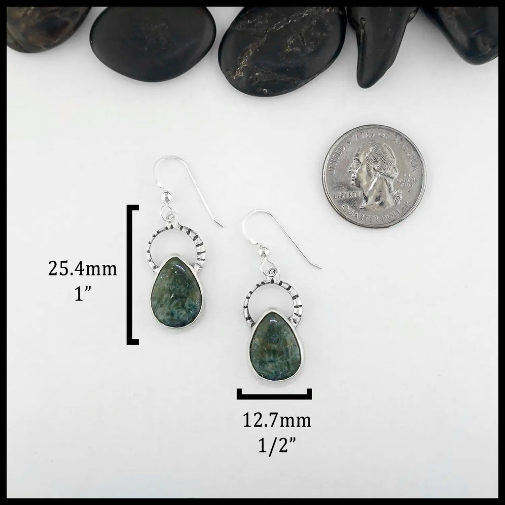Custom teardrop shaped green agate drop earrings set in silver with textured silver arches attached to ear wire. 25.4mm long, 12.7mm wide